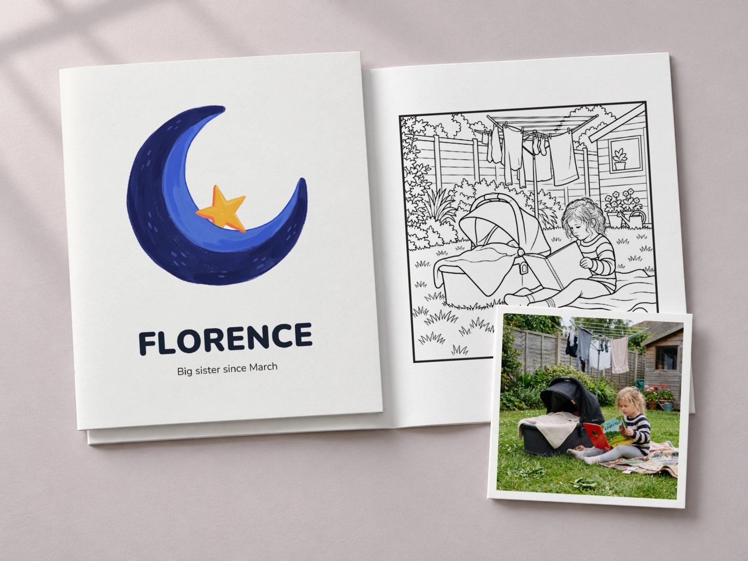 A big sister colouring book with a moon and the name Florence on its cover, beside the open page of a girl reading next to a carrycot on the lawn, with the photo it was drawn from as a print.