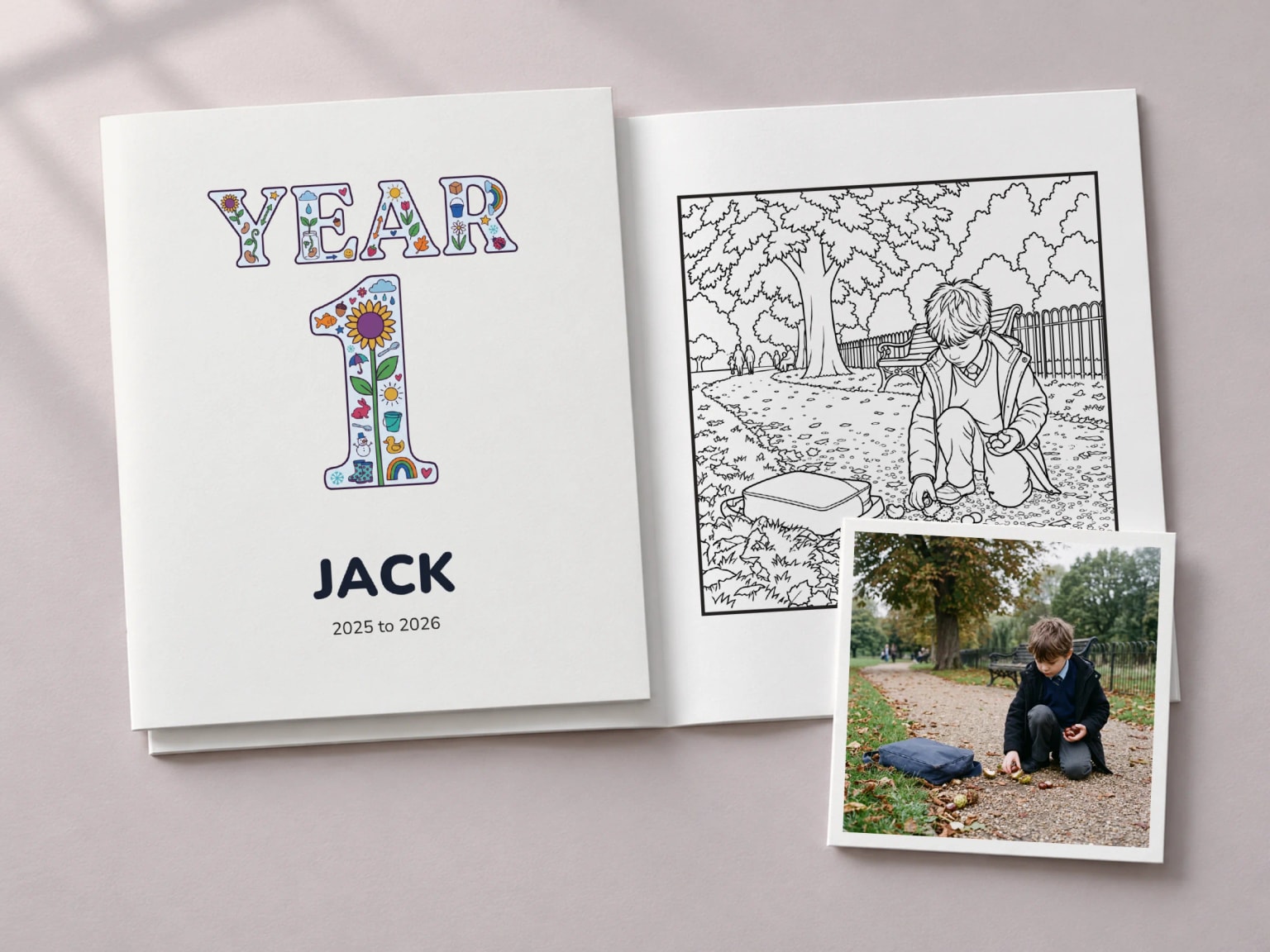 A Year 1 colouring book with the name Jack on its cover, beside the open page of a boy picking up conkers on a park path, with the photo it was drawn from as a print.